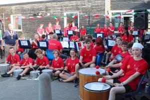 President Mike Barker with members of Seaford Head Band before their concert (Head of Music Dave Faulkner with his back to the camera)